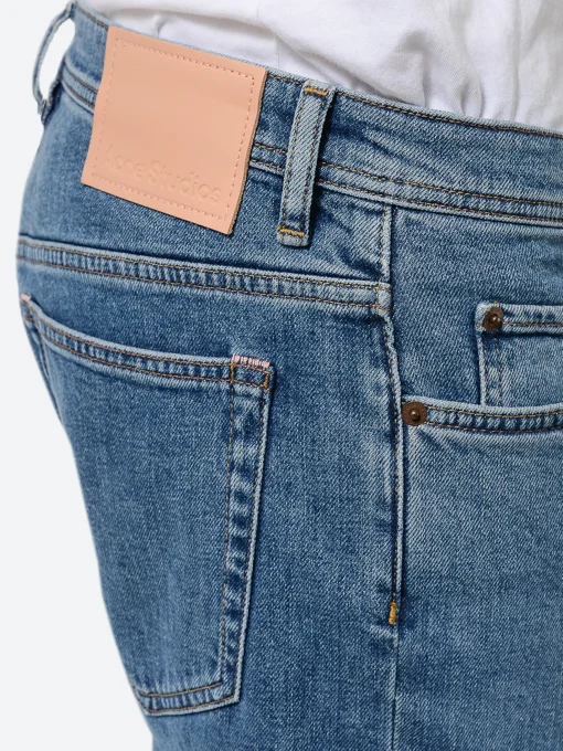 Discount - River Slim Tapered Jeans in Mid Blue Pants | Denim